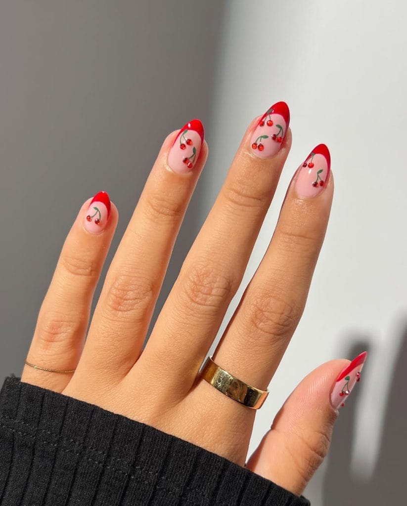 Red french tip nails with hand painted cherries 
