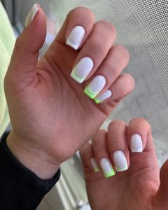  square July nails with white base and bright neon green double French tip lines
