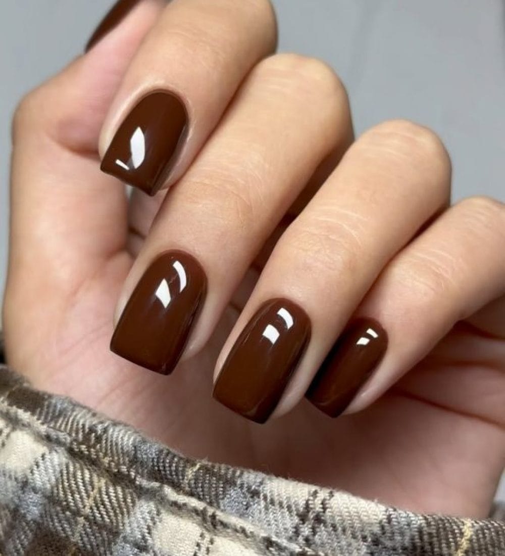 Short fall nails in chocolate brown with high gloss finish and square shape