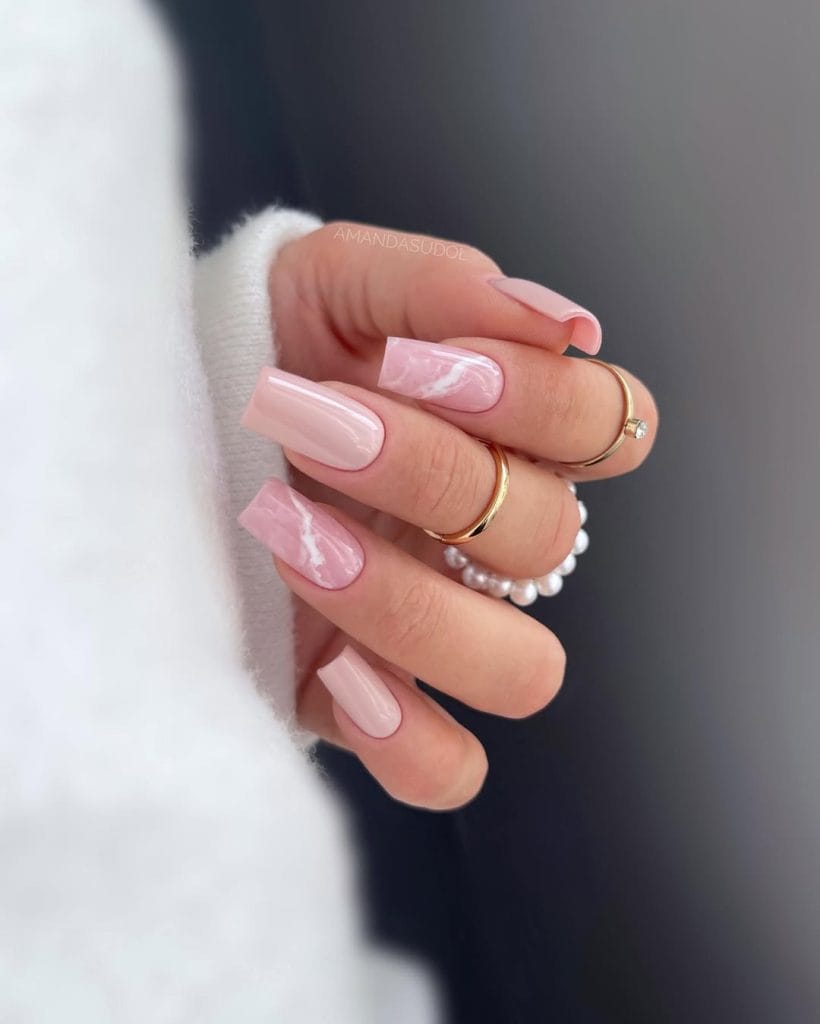  Nude marble neutral nails with white veining on medium square shape 